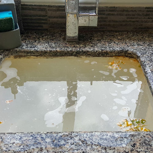 A Clogged Kitchen Sink.