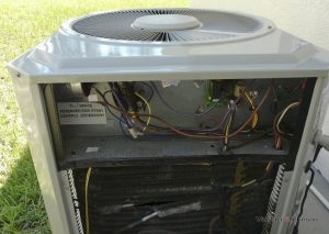 An air conditioner awaits HVAC parts repair service.